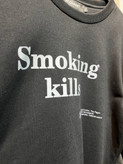 دورس ماچینیست طرح smoking kills پشت چاپ